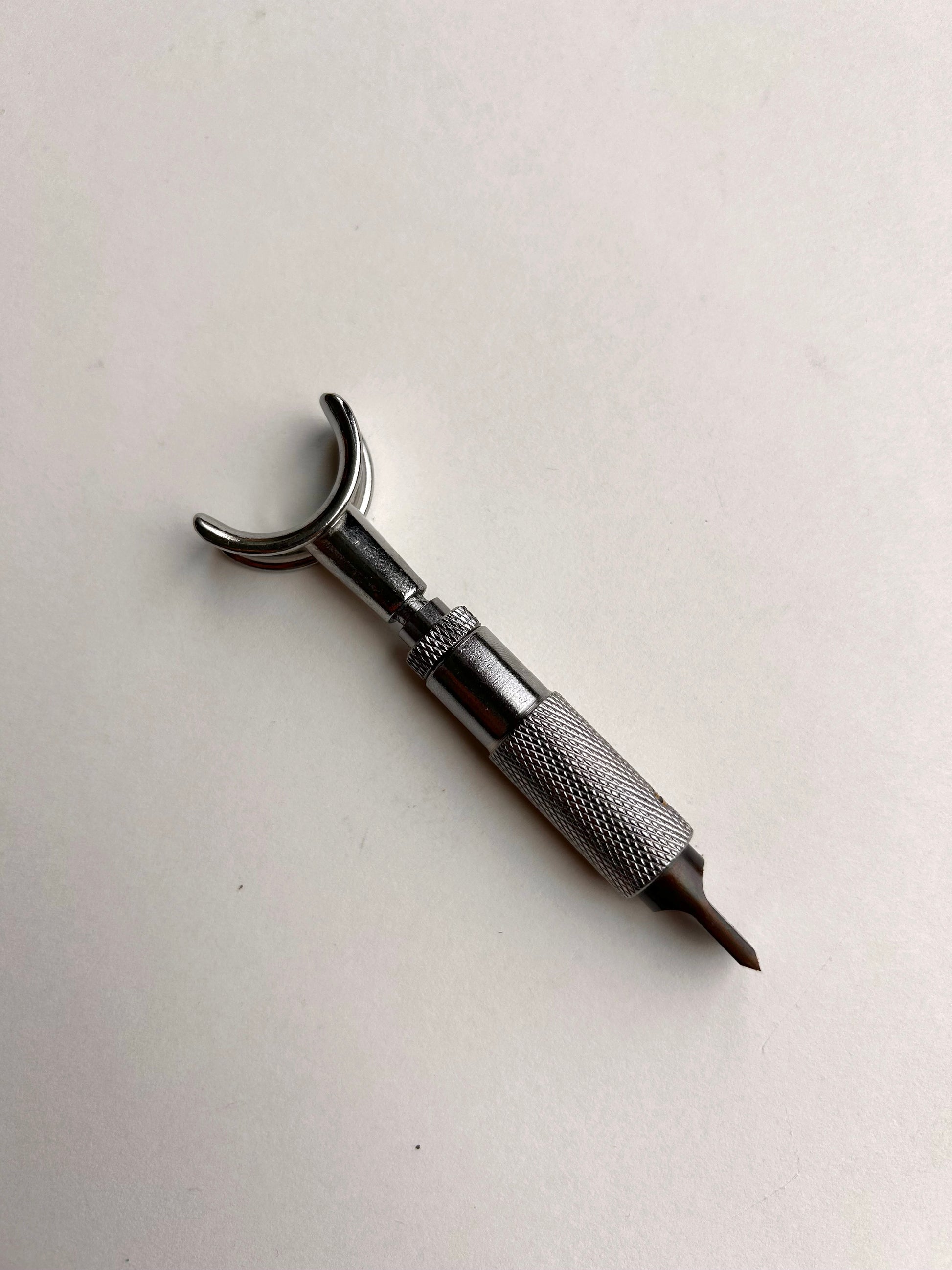 Leather carving swivel knife tool in silver colour.