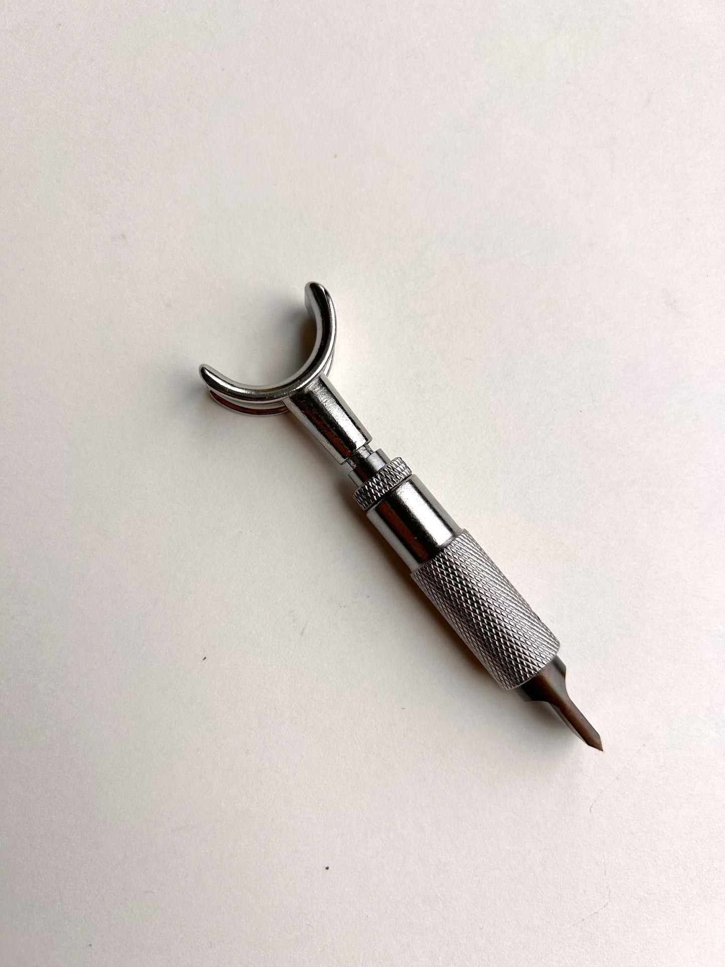 Leather carving swivel knife tool in silver colour.