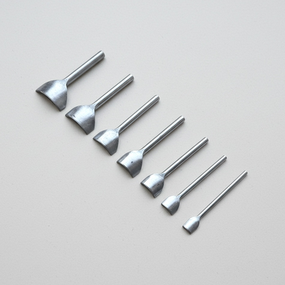 Leather round end punch set with a shallow arc