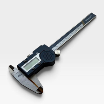 A digital caliper with a black handle and silver metal jaws, featuring an LCD screen and a sliding scale, shown on a light gray background.