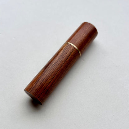 Wooden needle case with brass detail