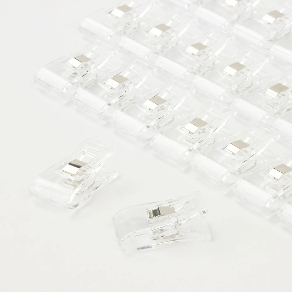 Leather edge clips in plastic